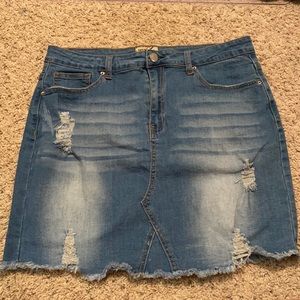 Light wash distressed jean skirt